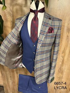 Shop for a 3-Piece Gray & Blue Notch Lapel Two Button Plaid Suit With Vest at Tuxedo Uomo in Los Angeles. You can find all kinds of fancy suits and ties from their Formal wear collections. Unique Tuxedos, Polished Casual, Dapper Mens Fashion, Fancy Suit, Mens Fashion Blazer, Blue Vests, Designer Suits For Men, Tuxedo Shirts