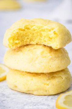 three lemon cookies stacked on top of each other