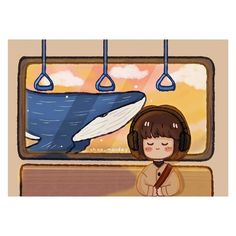 a girl with headphones is looking at a whale on the wall in front of her