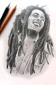 a pencil drawing of a man with dreadlocks and a smile on his face