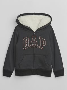 Soft, comfy fleece. Cozy sherpa lining at hood and body. Long sleeves with banded cuffs. Hood, zip front. Gap logo at front. Kanga pockets. Banded hem. #731642 Gap Logo, Sherpa Lined, Baby Gap, New Woman, Toddler Boys, Zip Hoodie, Gap, Long Sleeves, Sweatshirts Hoodie