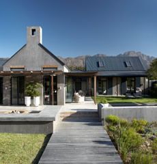 a house with a walkway leading to it