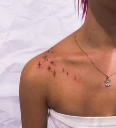 a woman's chest with stars on it