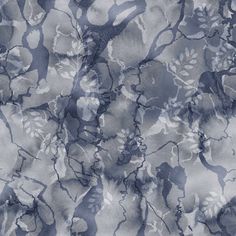 a blue and white floral pattern with leaves on the side, in shades of gray