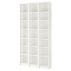 a white bookcase with six shelves on each side