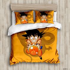 a bed with an image of gohan holding a ball in his hand on it