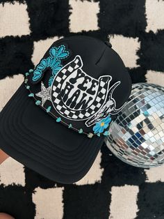 This custom made trucker patch hat is perfect for any occasion whether it be for spring/summer time, a lake hat, a gift for someone, or just a cute accessory to add a little spice to your outfit 🧢✨ DETAILS-  * This hat is one size with an adjustable SnapBack that is adjustable from 20in. - 23.5in. * The color of this hat is Black * The material of the hat is polyester with iron on patches  REFUNDS AND CANCELLATIONS- Every hat is handmade by me as a result, a slight variation can occur from the picture with patch size or placement. If you have any problems with your hat please message me within 24 hours of receiving your order and I'd be happy to help! No refunds or exchanges will be accepted after. CONNECT- To enter giveaways, discount codes, or behind the scenes, follow our pages. 📲 Ins Sublimation Hat Patch Ideas, Summer Trucker Baseball Cap, Spring Beach Trucker Hat, 5-panel, Summer Trucker Hat For Music Festivals, Trendy 5-panel Trucker Hat For Beach, Summer Trucker Snapback Hat, Black Trucker Hat For The Beach, Hip Hop Snapback Hat For The Beach, Black 5-panel Trucker Hat For Beach