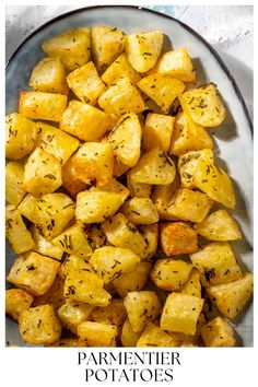 Parmentier potatoes in an oval dish on white napkins. Parmentier Potatoes, Roasted Mini Potatoes, Potato Cubes, French Potatoes, Potatoes Roasted, Mini Potatoes, Appetizers For A Crowd, Potato Recipes Side Dishes, Potato Sides