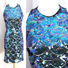 "This is stunning and there is a bit of stretch... so you can wiggle if you want! Measuring: 37\" length  36\" bust, 26\" waist, 38\" hip...Absolutely mermaid!! enjoy!" Blue Sequined Mermaid Dress For Night Out, Fitted Halter Neck Mermaid Dress For Evening, Fitted Sleeveless Dress With Mermaid Hem, Glamorous Sleeveless Bodycon Dress With Fitted Bodice, Fitted Sleeveless Mermaid Dress, Fitted Sleeveless Glamorous Mermaid Dress, Glamorous Sleeveless Fitted Mermaid Dress, Summer Backless Fitted Mermaid Dress, Summer Fitted Backless Mermaid Dress