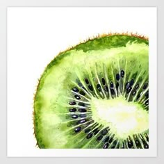 a slice of kiwi fruit with seeds on it's side and the center