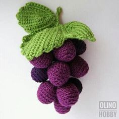 purple and green crocheted grapes with leaves