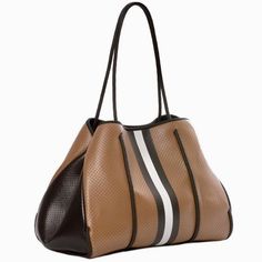 With a sporty chic and athletic vibe in mind, this tote is the ultimate accessory to finish off any look!! Whether headed to the gym or off to a meeting, rock this tote for any and all of your needs!! Providing fashion and function, this is a must-have addition to any wardrobe!! Neoprene Shell and Lining Interior Detachable Small Zipper Pouch H: 6" X W:8 1/2" X D: 1/2" Interior Lining: Black H: 12" X W: 15" X D: 8" Shoulder Drop: 8 1/4" Trendy Tote Gym Bag With Zipper Closure, Trendy Gym Bag With Zipper Closure For Everyday, Sporty Gym Bag With Double Handle For Daily Use, Sporty Double Handle Gym Bag For Daily Use, Sporty Everyday Gym Bag With Double Handle, Sporty Large Capacity Shoulder Bag For Everyday, Sporty Everyday Shoulder Bag With Double Handle, Sporty Shoulder Bag With Large Capacity For Everyday, Sporty Gym Bag With Double Handle For Everyday Use