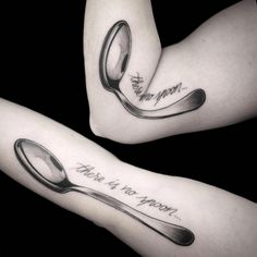 two tattoos with spoons and words on their arms that say, there is no spoon