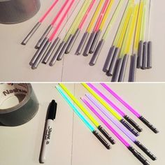 several different colored straws and pens on a table