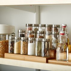 an assortment of spices and condiments on a shelf