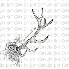 a deer's antlers with sunflowers on it