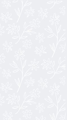 a white flower pattern on a gray background