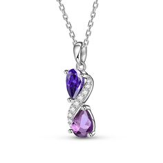 Step into a world of enchantment with this stunning necklace, adorned with two lustrous pear-cut purple stones, each exuding its unique shade and allure. Nestled between them, a radiant swirl of glistening white stones adds a touch of celestial brilliance, creating a harmonious dance of colors and light. Embrace the beauty of contrast and sophistication, let this exquisite piece be a symbol of your elegance and charm, a timeless treasure that captures the essence of grace and luxury.Carat Weight Purple Teardrop Gemstone Necklace, Elegant Purple Clavicle Chain Necklace, Purple Cubic Zirconia Gemstone Necklace, Purple Gemstone Necklace In Cubic Zirconia, Purple Gemstone Necklace With Cubic Zirconia, Elegant Purple Amethyst Drop Necklace, Elegant Purple Teardrop Pendant Jewelry, Fine Jewelry Purple Cubic Zirconia Necklaces, Purple Pear-shaped Gemstone Jewelry