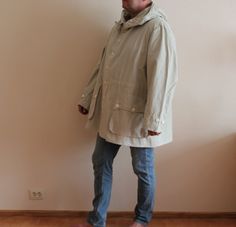 "Vintage Jacket Canvas Parka Grey Windbreaker Gray Unisex Jacket Bomber Jacket Button Up Lightweight Parka Oversized Hooded Plus Size Extra Large Label size: C 54 Shown on model XL Measurements (lying flat): Length: 37.5\"/ 95 cm Shoulders: 22.5\"/ 57 cm Sleeve: 28\"/ 71 cm Pit to pit: 32\"/ 81 cm Condition: great Vintage Condition Please check measurements to insure a proper fit. Remember to allow yourself some extra room for movement. You can compare these with something from your closet that