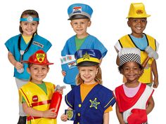 group of children dressed in costumes posing for the camera on a white background with one child wearing a fireman's hat