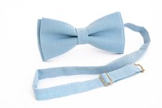 "-------------------------------------------------- Fabric swatches color: K6 ------------------------------------------------- Bow tie sizes Large for Adult's Bow tie size Width: 4,6\" / 11,5 cm | Height: 2.3\" / 5.8cm The bow tie is attached to an adjustable strap. Fitting approx 13'' - 19'' neck size. (For 14 yrs up to adult's) Medium for Boy's Bow tie size Width: 4\" / 10 cm | Height: 2\" / 5cm The bow tie is attached to an adjustable strap. Fitting approx 10'' - 15'' neck size. (For 6-13 yr Blue Bow Tie For Summer Weddings, Summer Wedding Bow Tie With Tie Back, Summer Groom Bow Tie, Dusty Blue Bow Tie, Blue Standard Bow Tie For Groom, Blue Summer Bow Tie With Tie Back, Light Blue Bow Tie, Adjustable Blue Standard Bow Tie, Blue Adjustable Bow With Ties