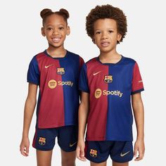 Nike 2024-25 Barcelona Little Kids' Stadium Home Kit (Models - Jersey) Sportswear Team Logo Short Sleeve Jersey, Sportswear Jersey With Team Logo And Short Sleeve, Sportswear Short Sleeve Jersey With Team Logo, Short Sleeve Sportswear Jersey With Team Logo, Sporty Short Sleeve Training Jersey, Sporty Short Sleeve Jersey With Team Logo, Casual Short Sleeve Jersey For Training, Deep Royal Blue, Young Athletes