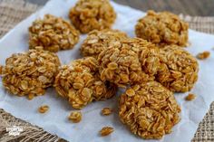 some granola balls sitting on top of a piece of paper