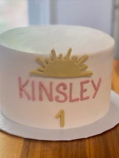 a cake with the name kinsley on it