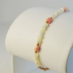 Coral Tulip Bracelet Elegant Coral & Mother Of Pearl Beads, 7”, And Gemstones Set In Yellow Gold Filled. White Single Strand Beaded Bracelet For Gift, White Polished Beads Bracelets As Gift, Elegant White Bracelet With Colorful Beads, Cream Jewelry With Colorful Beads, White Single Strand Bracelet Gift, White Single Strand Bracelet As A Gift, Elegant White Pearl Bracelet With Colorful Beads, Elegant White Pearl Bracelet With Faceted Beads, Adjustable Single Strand White Bracelet