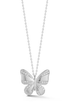 Dainty cubic zirconia bring whimsical sparkle to a textured butterfly pendant necklace crafted from rhodium-plated sterling silver. 18" length; 3/4"W x 5/8"L pendant Sterling silver/rhodium plate/cubic zirconia Made in Turkey Silver Cubic Zirconia Butterfly Necklace, Silver Butterfly Pendant Necklace In Cubic Zirconia, Silver Cubic Zirconia Butterfly Pendant Necklace, Silver Butterfly Pendant Necklace With Cubic Zirconia, Silver Diamond Butterfly Necklace With Charm, Silver Butterfly Necklace With Diamond Accents, Silver Diamond Butterfly Necklace, Silver Butterfly Necklace, Butterfly Pendant Necklace