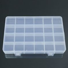 a plastic storage box with dividers on the top and bottom for small items in it