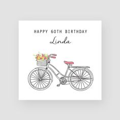 a birthday card with an illustration of a bicycle and flowers in the basket on it