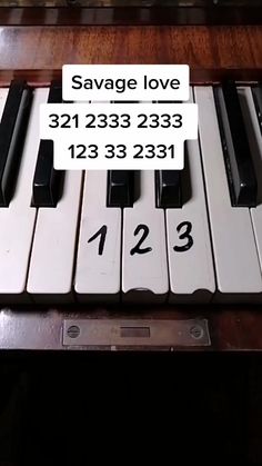 a keyboard with a sign on it that says salvage love 312323233