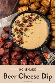 homemade beer cheese dip in a cast iron skillet surrounded by bacon and pretzels