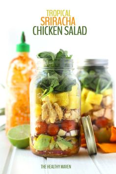 the healthy haven tropical sriraca chicken salad in a mason jar with limes