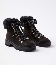 Trimmed in lush faux fur for warmth, comfort, and glam, these hiking boots are essential everyday outfit transformers all winter long. Lace-up front. Padded footbed for comfort. 1 3/4" heel.,Imported:Imported,Fabrication:Upper Plastic 72%+ Textile 24%+ Metal 4% Outsole Plastic 100% Loft Faux Fur Trim Hiking Boots Size 9 1/2 Black Women's by Loft Size Regular - 9 1/2 Black Women's Boots, Footwear, Upper, Plastic, 72%+, Textile, 24%+, Metal, 4%, Outsole, Plastic, 100% Black Winter Hiking Boots For Cold Weather, Black Faux Fur Boots For Winter, Short Heel Boots, Leopard Ankle Boots, Fur Top, Brown Chelsea Boots, Brown Booties, Black Suede Boots, Black Boots Women