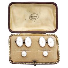 A fine and impressive vintage mother of pearl, pearl, 14 karat white gold and 14 karat yellow gold, cufflink and collar stud, gents dress set - boxed; part of our diverse vintage jewelry and estate jewelry collections. This impressive gents dress set of vintage mother of pearl and pearl cufflinks and studs has been crafted in 14k yellow gold with 14k white gold settings. The 1950's cufflinks have an oval form, whilst the studs are circular in style. The anterior face of each link is embellished Gents Dress, Pearl Cufflinks, Cocktail Set, Vintage Cufflinks, Vintage Pearls, Mother Pearl, Dress Set, Vintage Jewellery, Organic Shapes