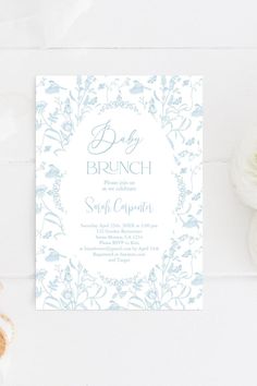 a blue and white floral brunch party card with the word brunch on it