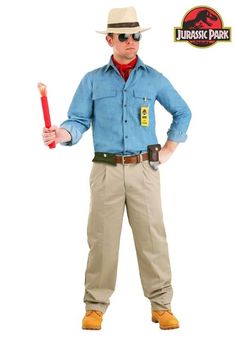 a man in a blue shirt and hat holding a red fire extinguisher