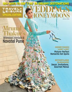 a woman in a dress on the cover of a magazine