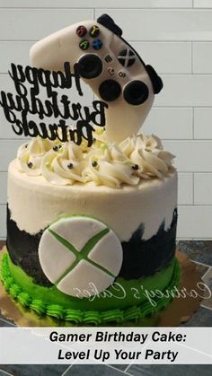 a birthday cake with a video game controller on top