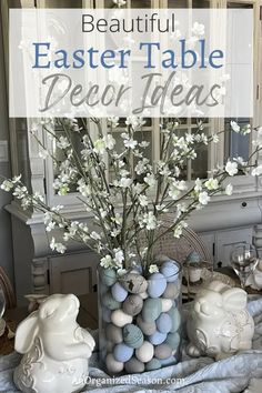 a vase filled with eggs and flowers on top of a table