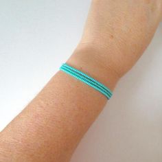 This is a set of 3 turquoise bracelets.  We can make these in any color! Also, please choose size at checkout.❤ SIZESThis item comes in several sizes, kindly choose at checkout. The standard size for an average woman is 7”. For a child, perhaps a 6” would be appropriate.❤ PROCESSING AND SHIPPINGMost orders are made and shipped out in one business day. Please check delivery timeframes for your location on the description below. ❤ CUSTOM ORDERSIf you like this item in a different color, send me a Simple Beaded Bracelets, Average Woman, Turquoise Bracelets, Bracelets Set, Red Necklace, Jewelry Essentials, Bead Bracelets, Seed Bead Bracelets, Bridesmaid Earrings