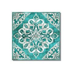 a blue and white tile with an intricate design