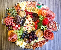 a platter filled with lots of different types of food