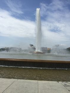 a large fountain spewing water into the air