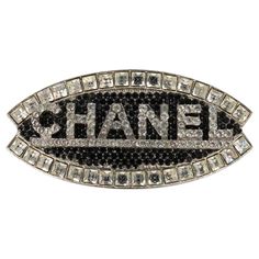 Chanel - (Made in France) Golden metal ring ornamented with rhinestones. Size 56 and 58. Fall-Winter 2003 Collection. Additional information: Condition: Very good condition Dimensions: Length: 6.5 cm Period: 21st Century Seller Reference: ACC96 Chanel Ring, Metal Ring, Metal Rings, 21st Century, Made In France, Metallica, Jewelry Rings, Fall Winter, Chanel