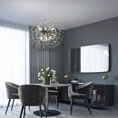 an elegant dining room with gray walls and chairs