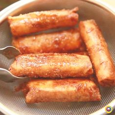 some fried food is in a bowl with a spoon