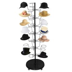 a hat rack with hats on it and a black stand holding several different types of hats